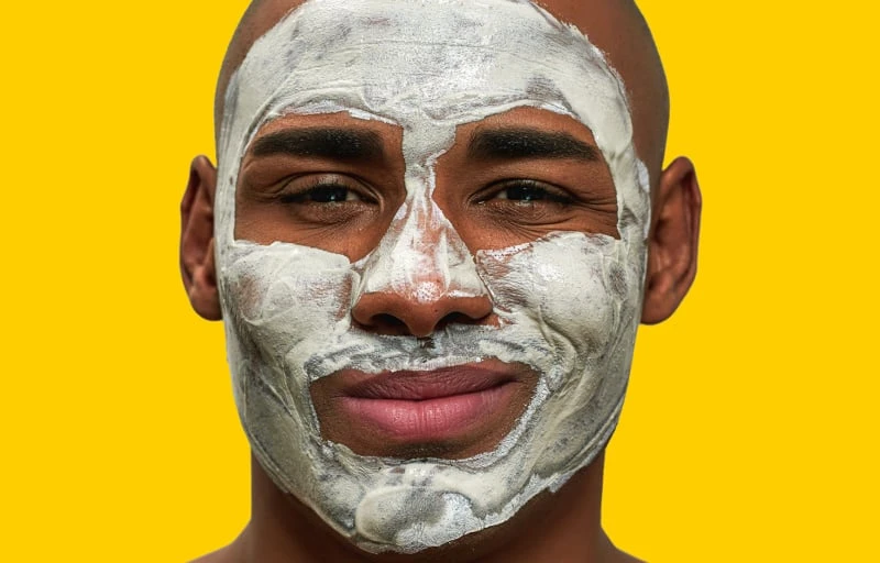 Model Wearing Geologie Micro Exfoliator and 3 Minute Clay Mask