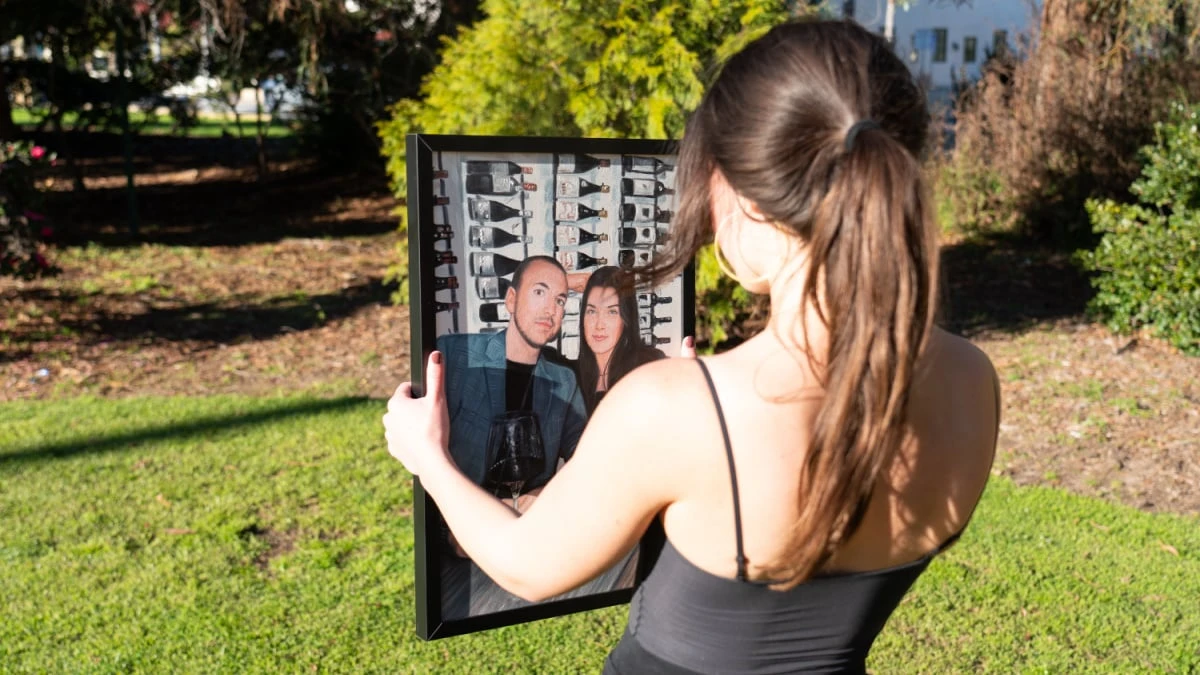 PaintYourLife Review Girl Holding Up Portrait of Herself and her Boyfriend