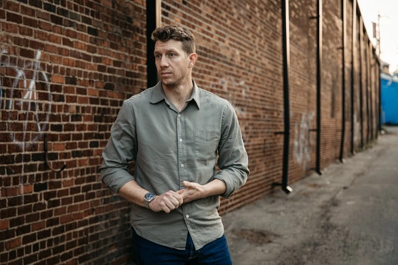 Buck Mason twill shirt sage on model