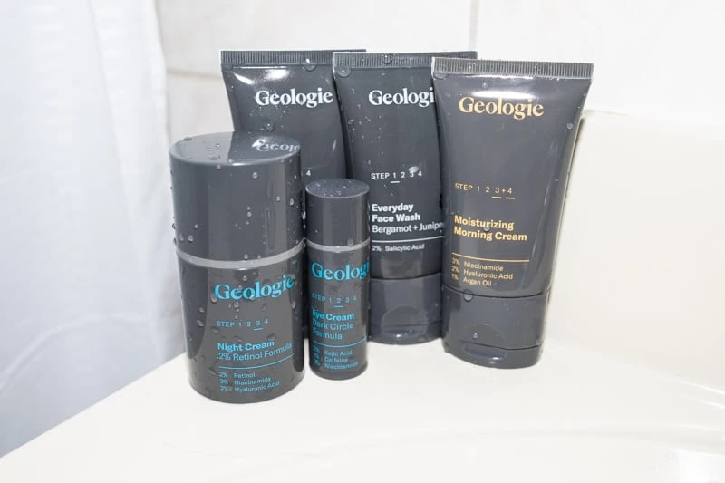 Geologie skincare set with updated packaging on sink counter