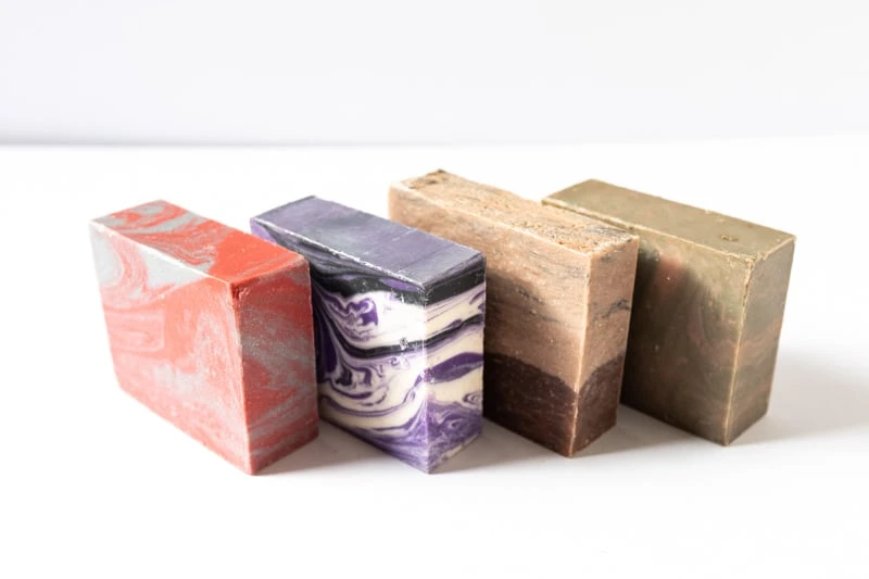 Dapper Yankee Review: Natural Soaps That Are Not Like the Others 58 Dapper Yankee Bar Soaps angled on white background