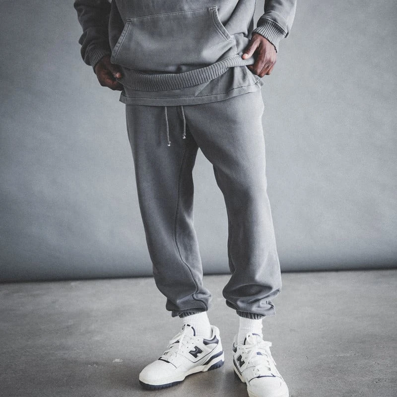 Model Wearing Elwood Core Sweatpants and trainers