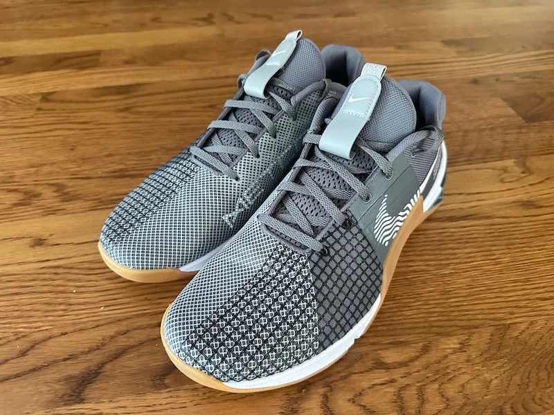 Nike Metcon 8 on ground with mesh upper