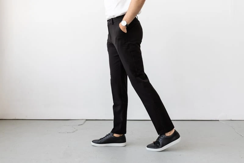 Quince Ultra Stretch Performance Smart Chinos in black from the side