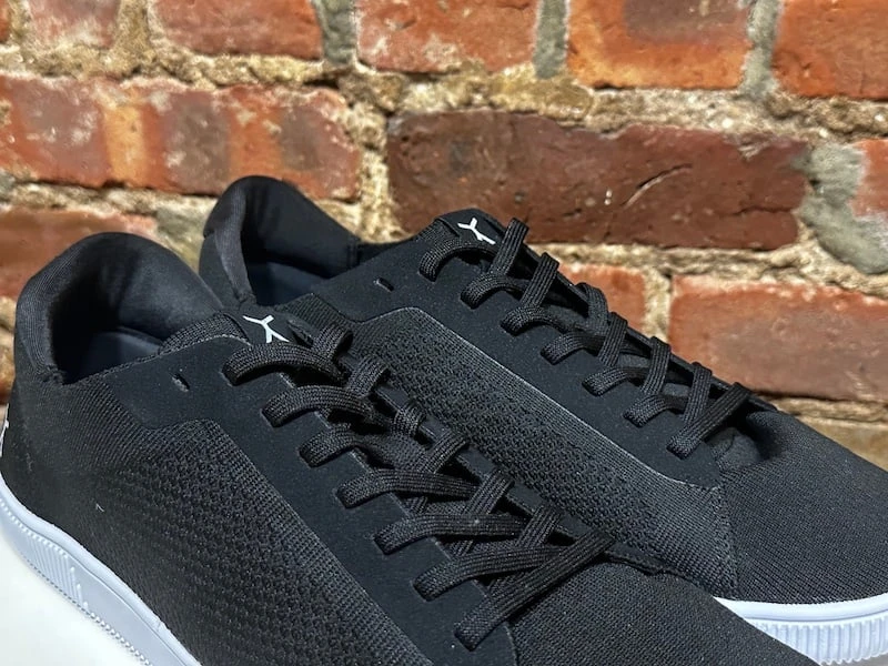 Up close image of Flux Adapt Trainer upper in black