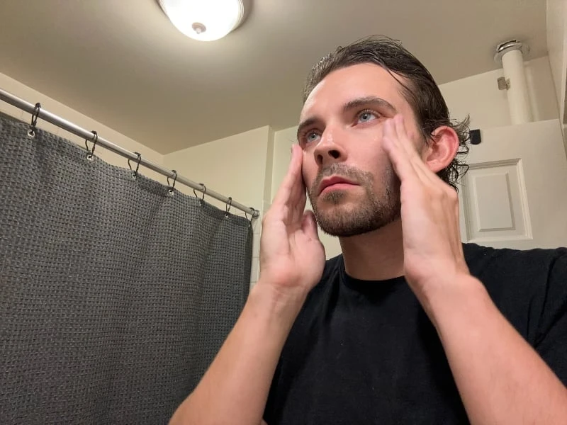 These 7 Things Have Made My Skin Noticeably Better In a Year 27 The Adult Man Disco Skincare Trying on Face Scrub