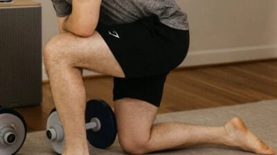 Gymshark Review for Men Model Wearing Gymshark Crest Shorts While Working Out