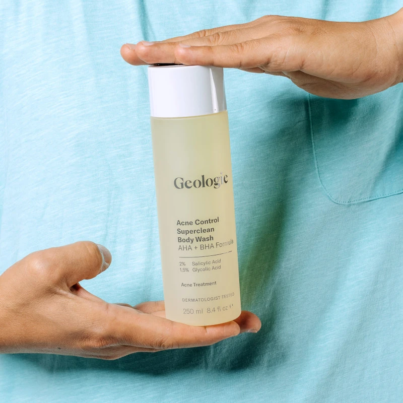 Man Holding Geologie Acne Control Superclean Body Wash