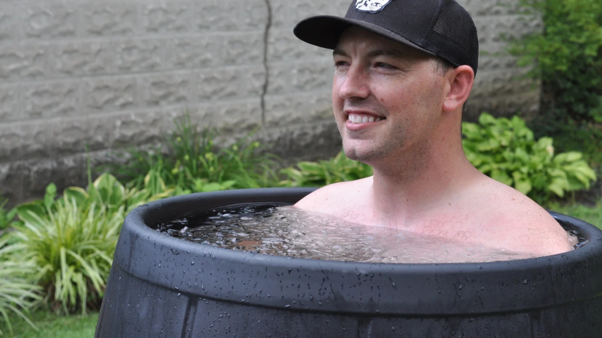 Ice Barrel Review Man Doing Cold Therapy in Ice Barrel 400