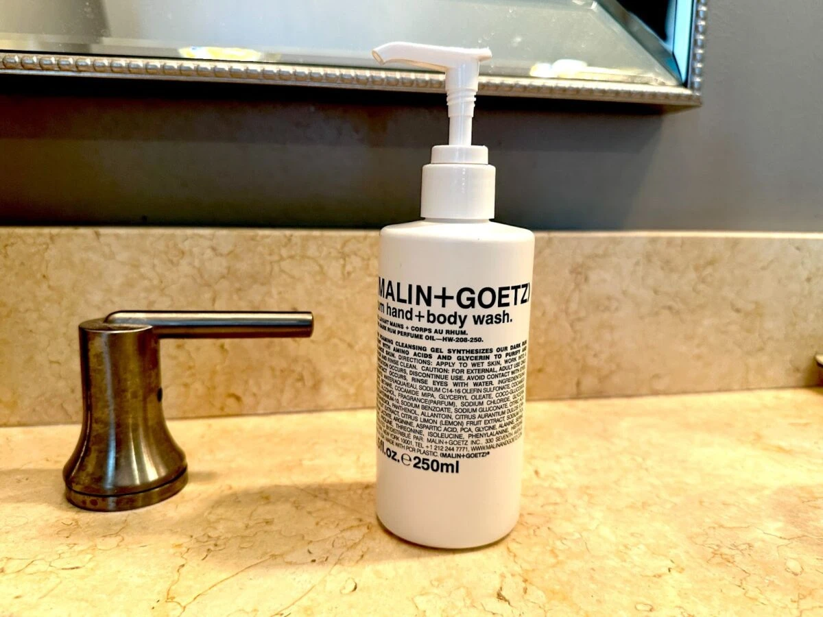 MalinGoetz skincare body and hand wash near sink