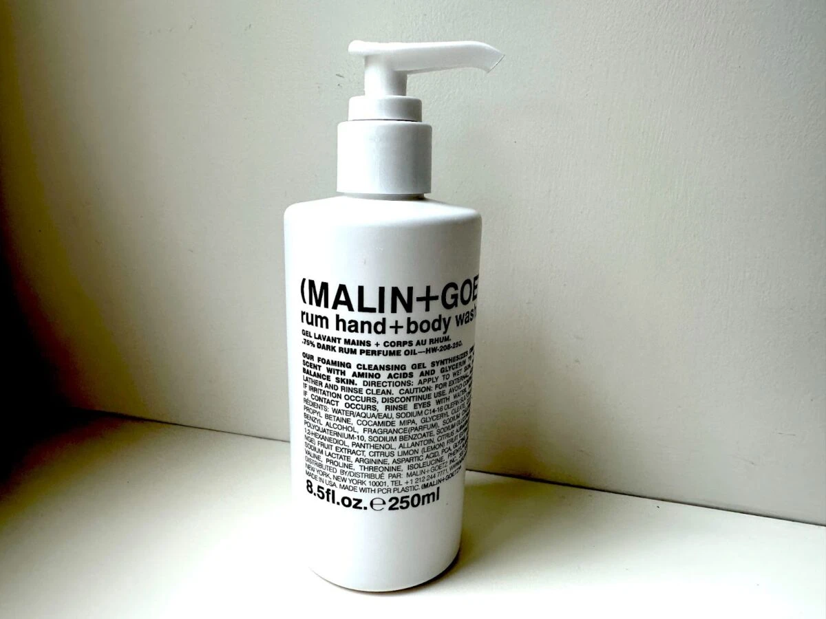 MalinGoetz skincare body wash behind white background