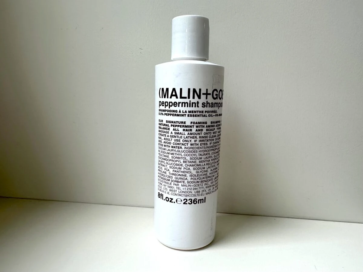 MalinGoetz skincare peppermint shampoo behind white background