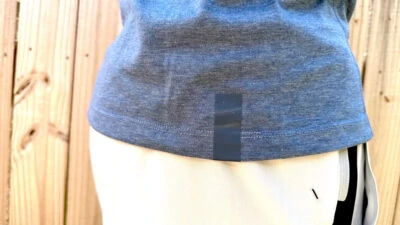 Ten Thousand Review Up Close on Side of Ten Thousand Durable Shirt in Blue