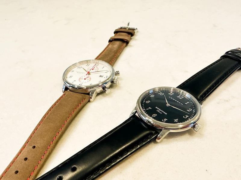 Armogan Watches laid out on table