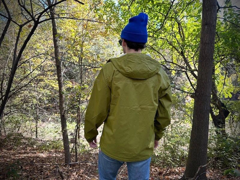 The Adult Man Helly Hansen Loke Shell Jacket Looking Forward in Forest