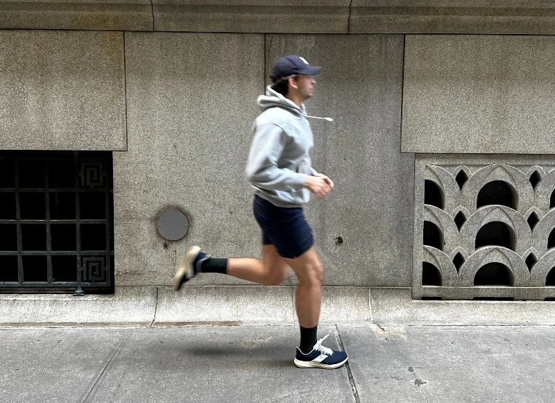 The Adult Man Tracksmith Eliot Runner Cover Image