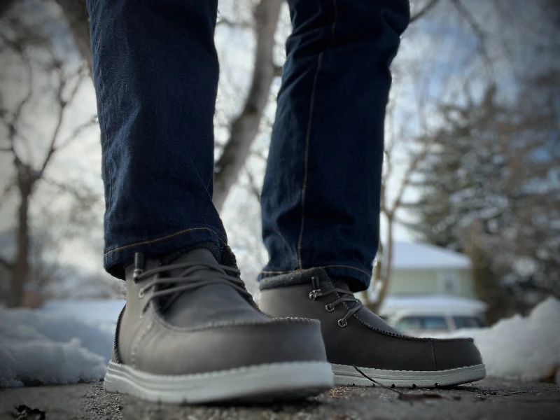 The Adult Man Bruno Marc Slip On Winter Boots on Sidewalk 800