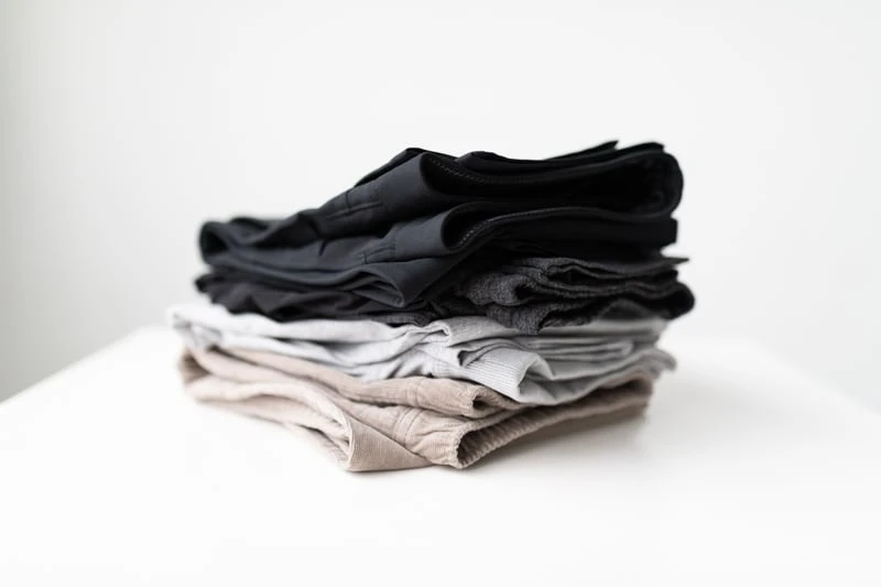 Vuori pants in a stack