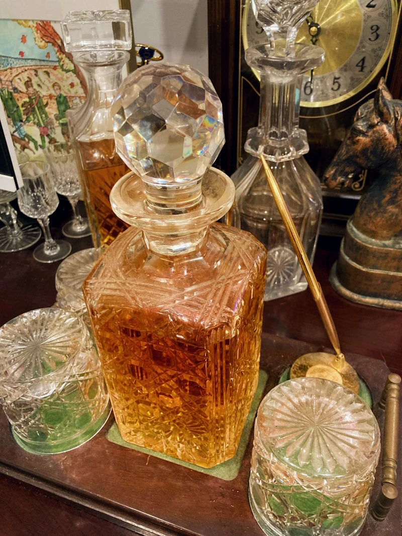 A Bottle of Whiskey and Some Glasses