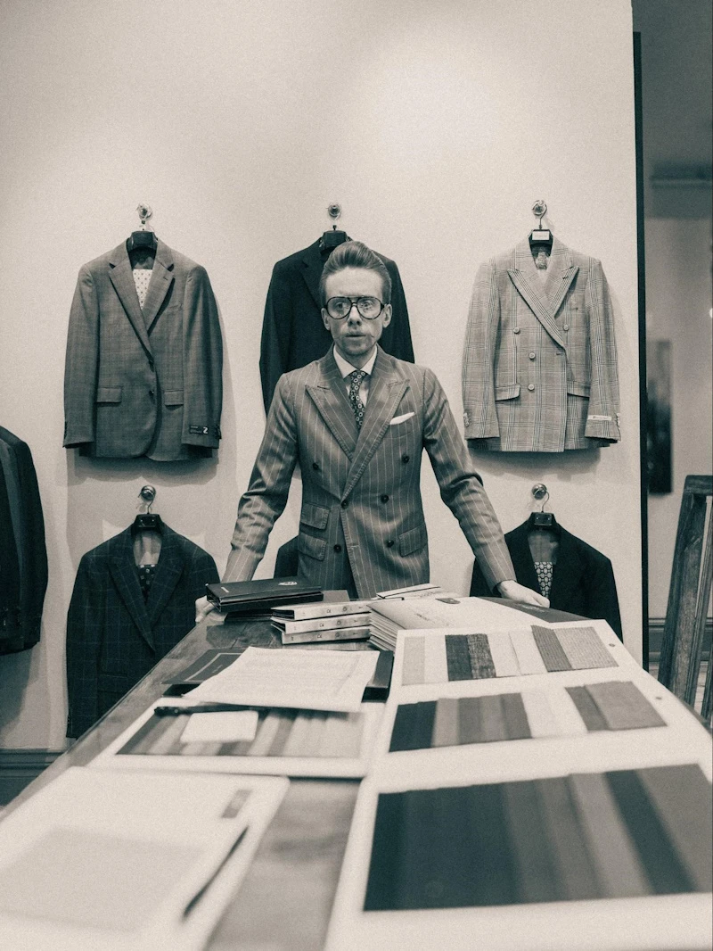 Black and White photo of Model Wearing Striped Suit