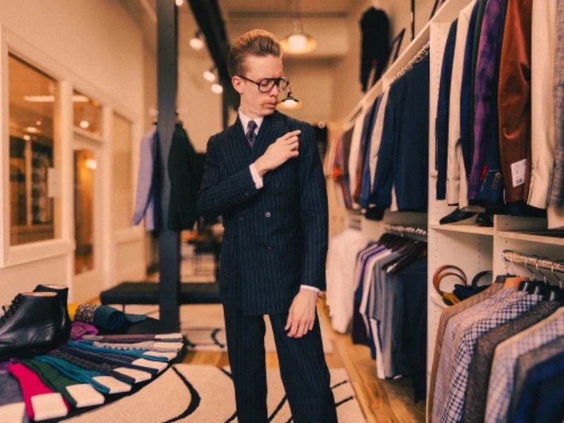 Photo of Model Posing in Striped Suit