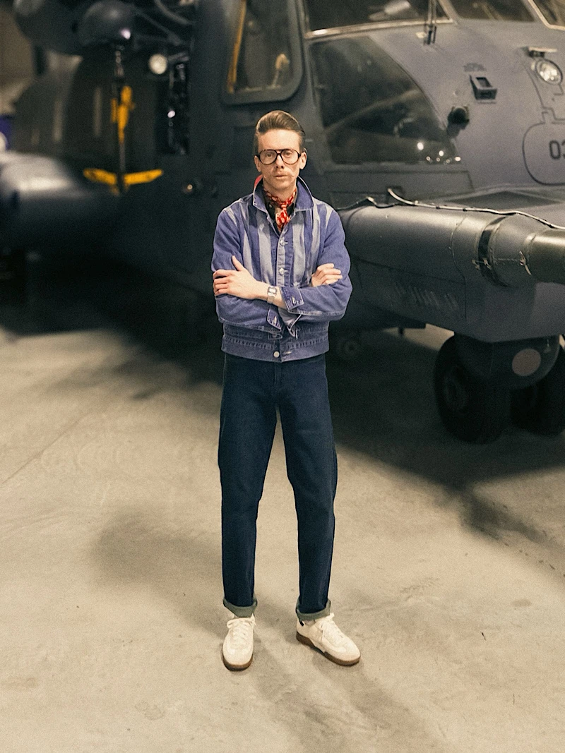 Photo of Model Standing Cross armed and wearing jacket and pants