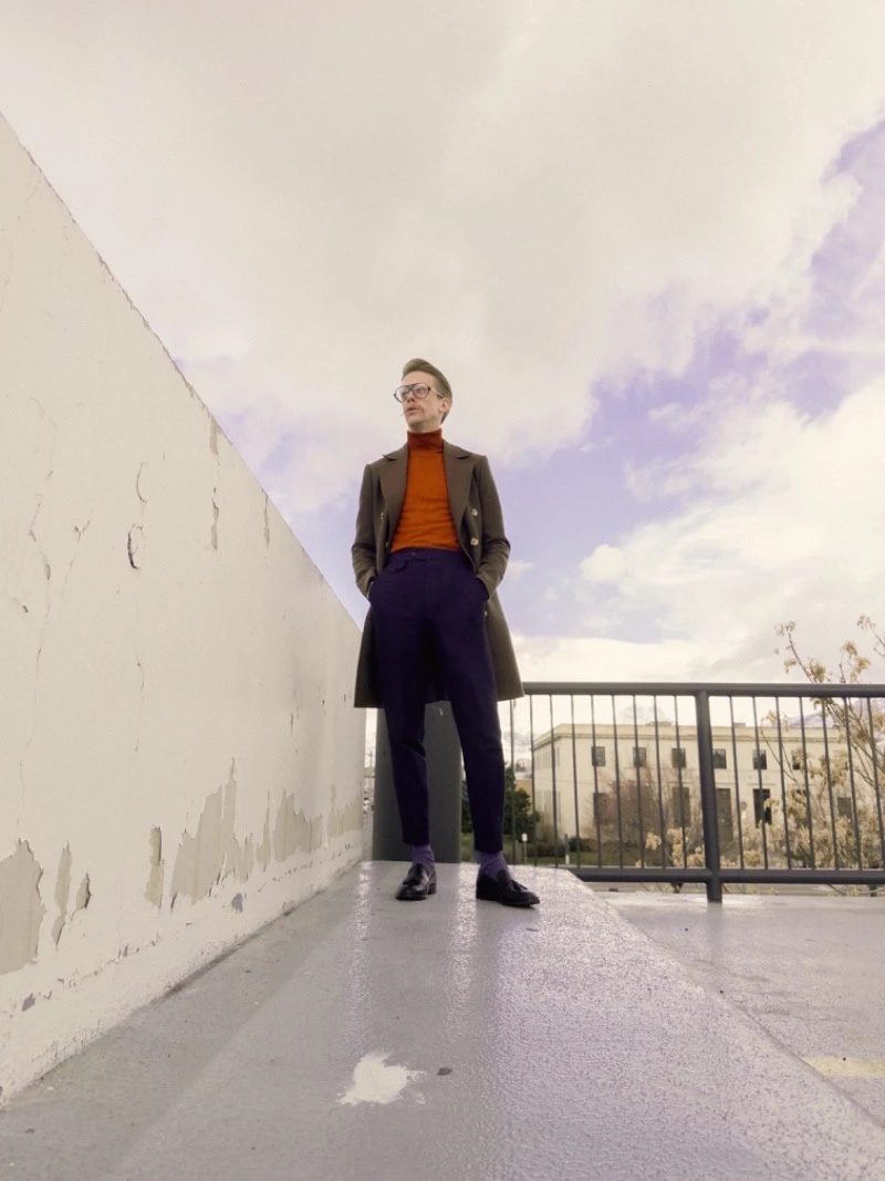 Photo of Model Wearing Overcoat and Purple Pants