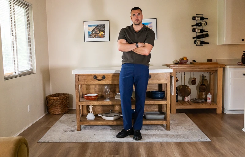 Model crossing arms in ABC Classic fit 5 Pocket Utilitech Pant