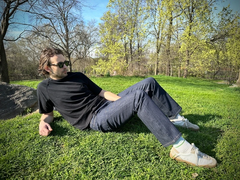 The Adult Man Cozy Earth Bamboo Lounge Tee Sitting on Grass 800