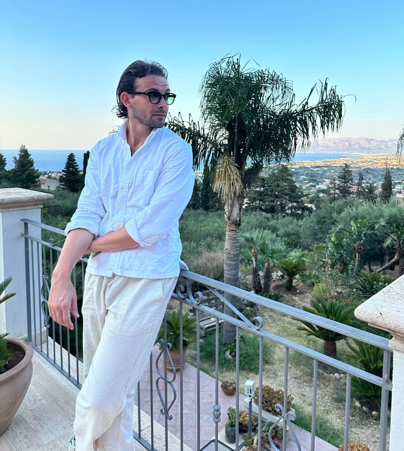 The Adult Man Model Wearing Linen Pants in Italy