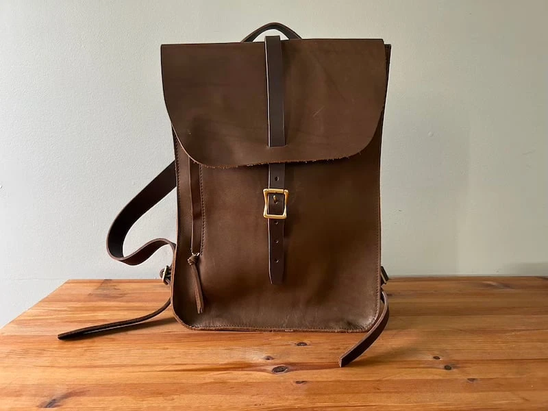 The Adult Man WP Standard Ellis backpack on table copy